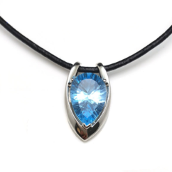 Shape Pendant in 925 sterling silver with natural sky blue topaz